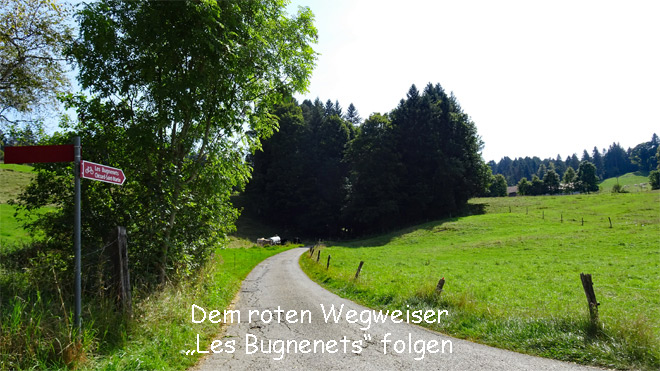 Dem roten Wegweiser Les Bugnenets folgen
