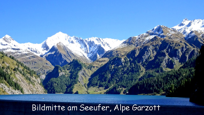 Blick azur anderen Seeseite, sichtbar die Hütte der Alpe Garzott